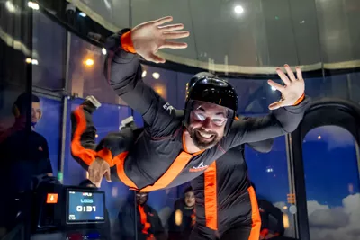 Man flies in iFLY indoor skydiving tunnel at The Bear Grylls Adventure Birmingham