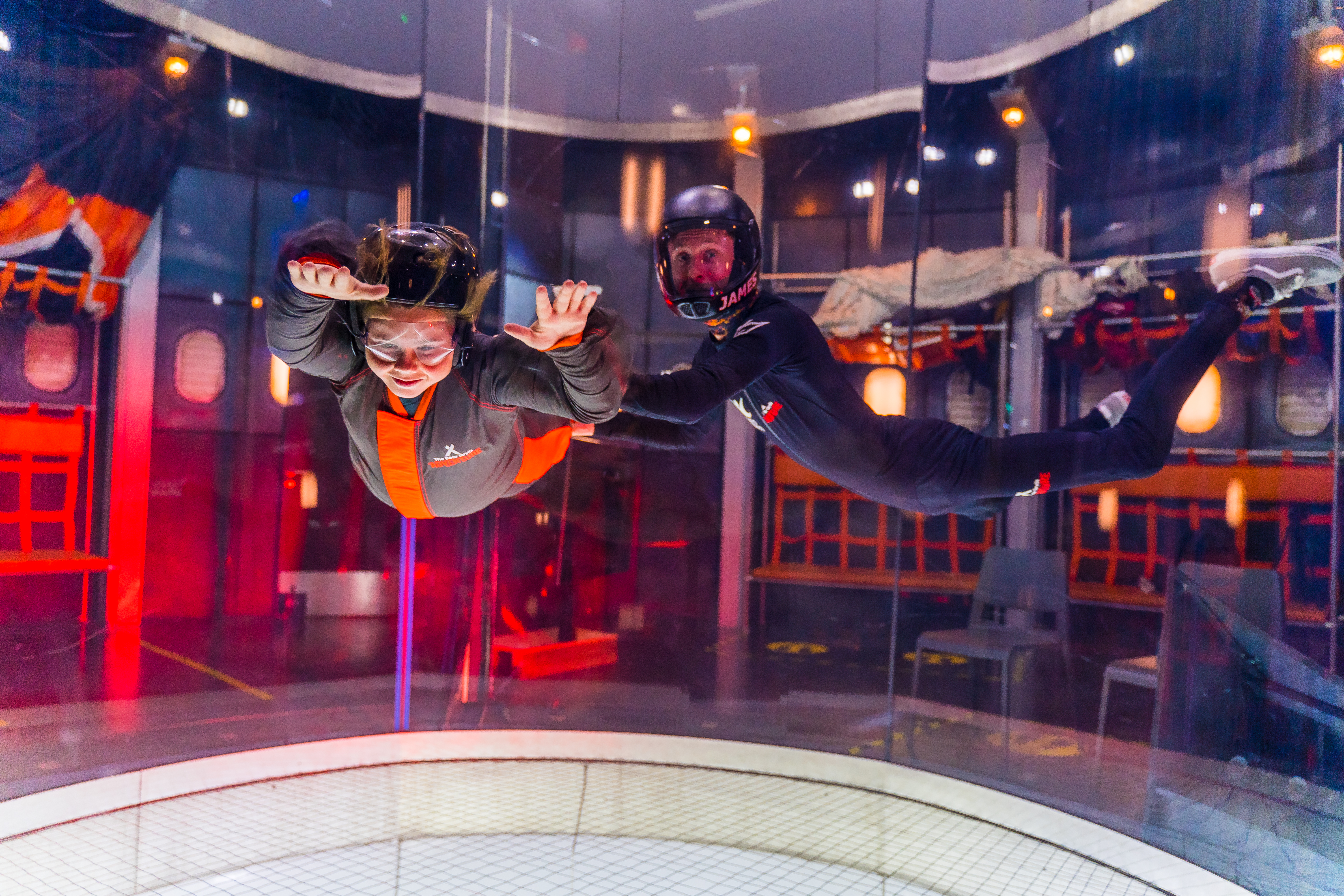 Young boy flies in iFLY indoor skydiving tunnel at The Bear Grylls Adventure Birmingham