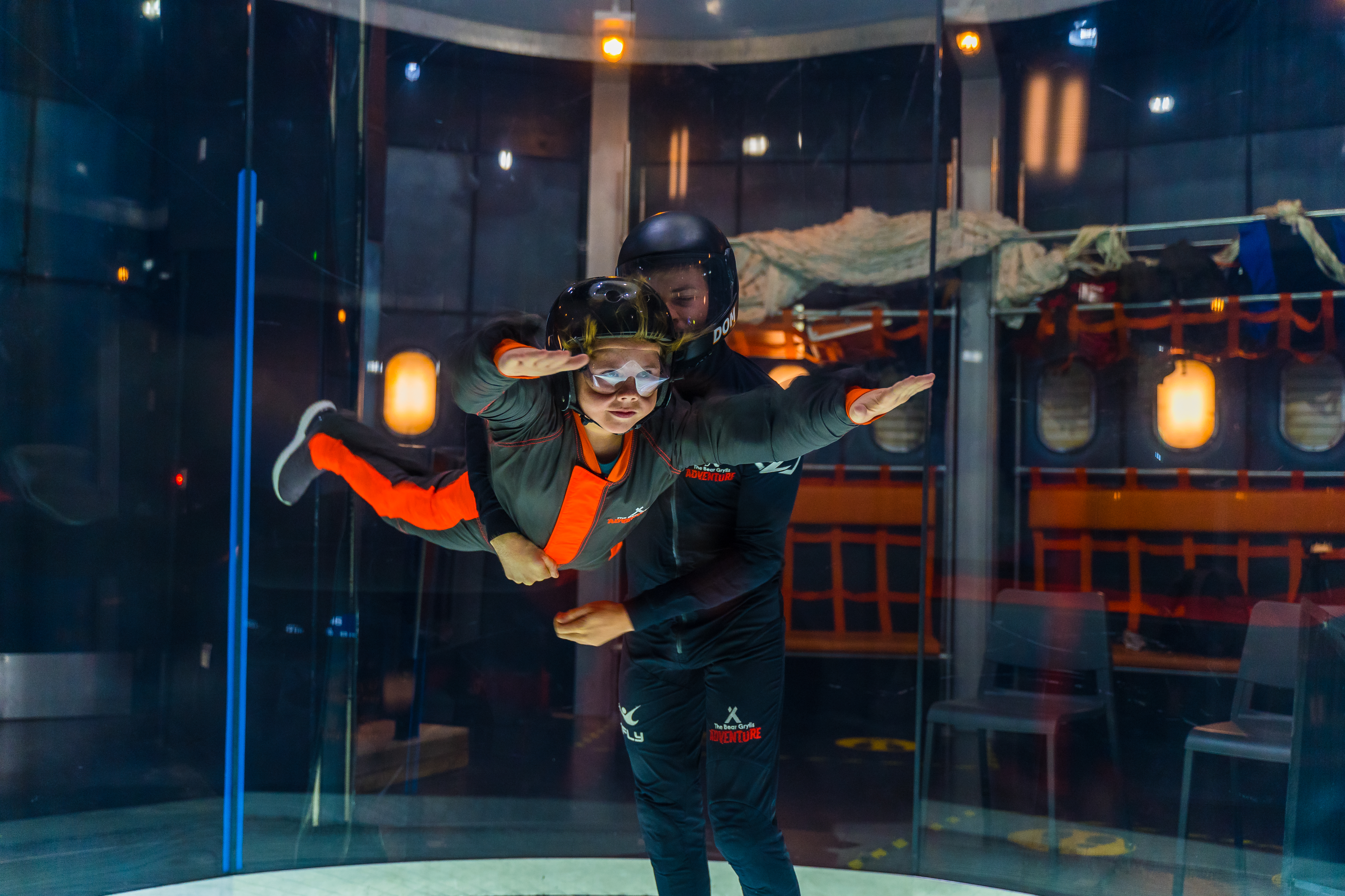 Young boy flies in iFLY indoor skydiving tunnel at The Bear Grylls Adventure Birmingham
