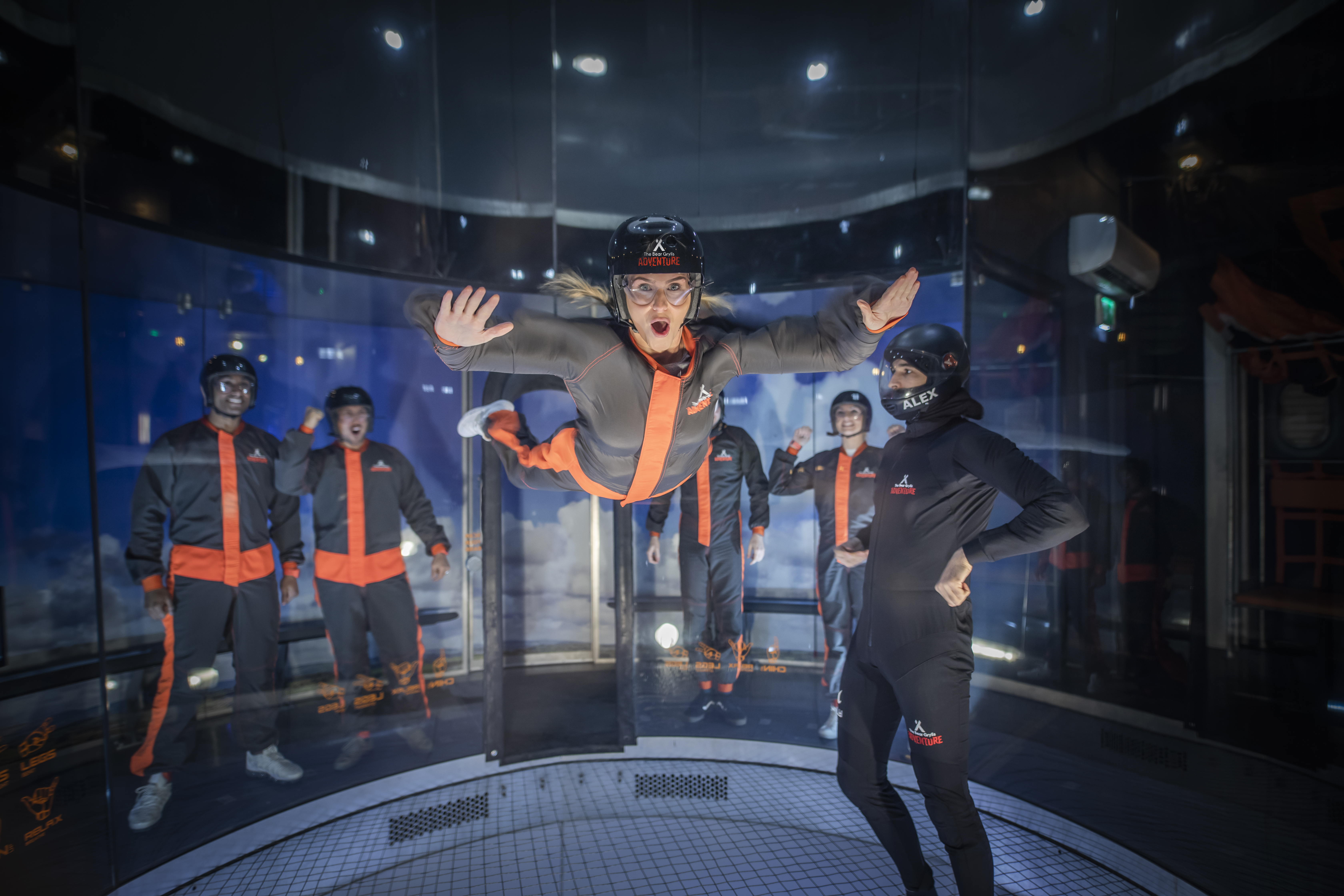 Woman flies in iFLY indoor skydiving tunnel at The Bear Grylls Adventure Birmingham
