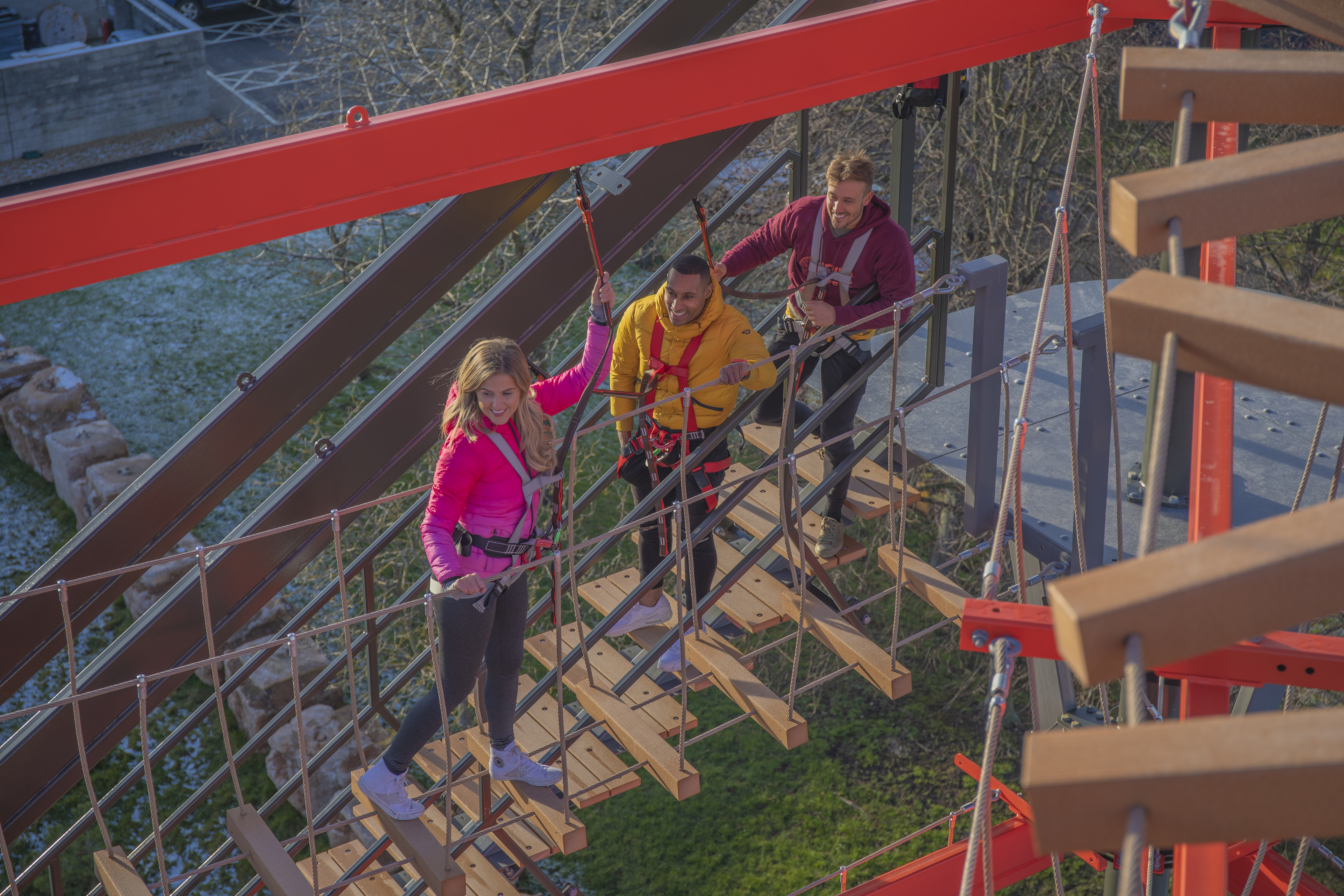 Group of friends on the High Ropes course at The Bear Grylls Adventure Birmingham