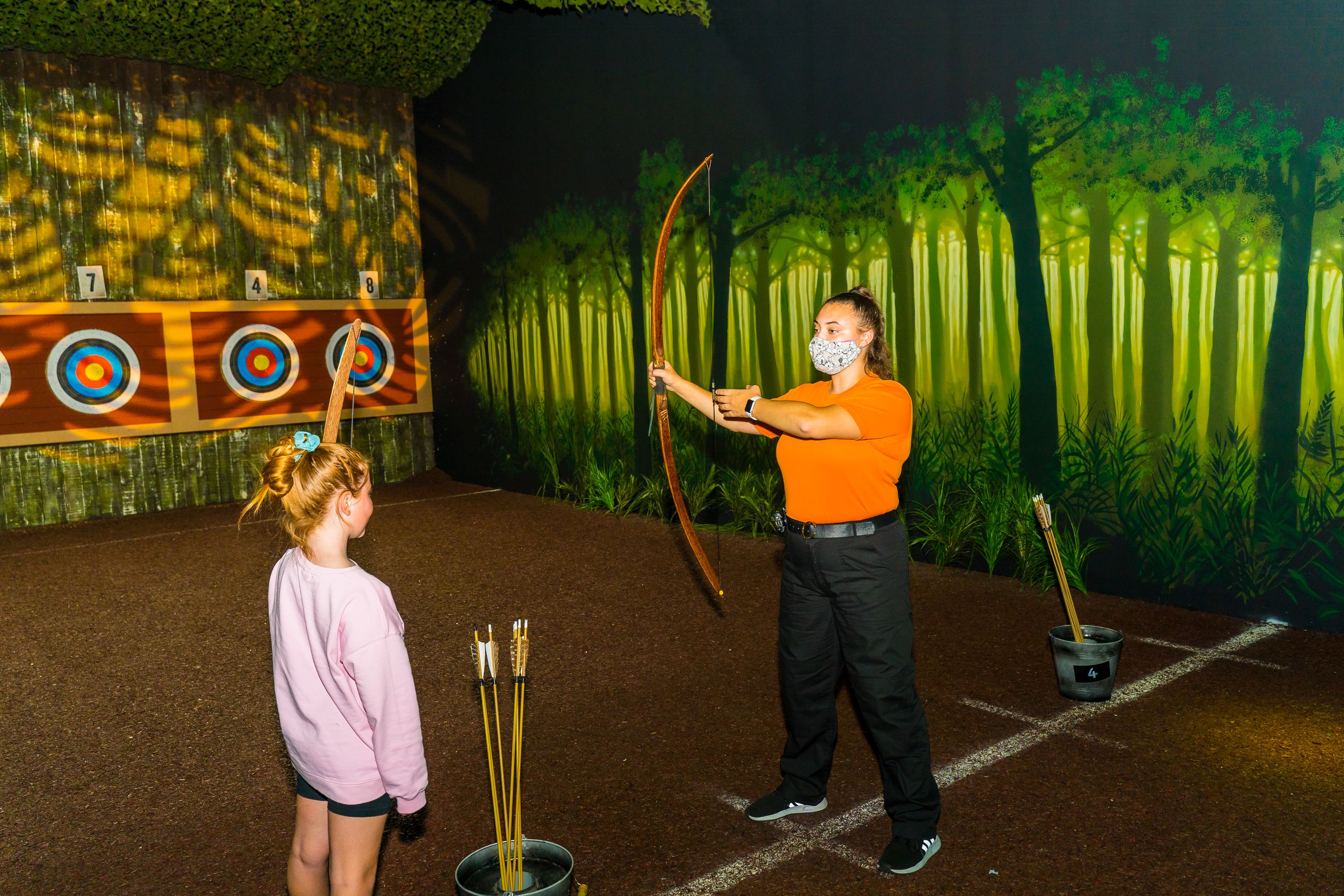 Instructor gives briefing on Archery range at The Bear Grylls Adventure Birmingham