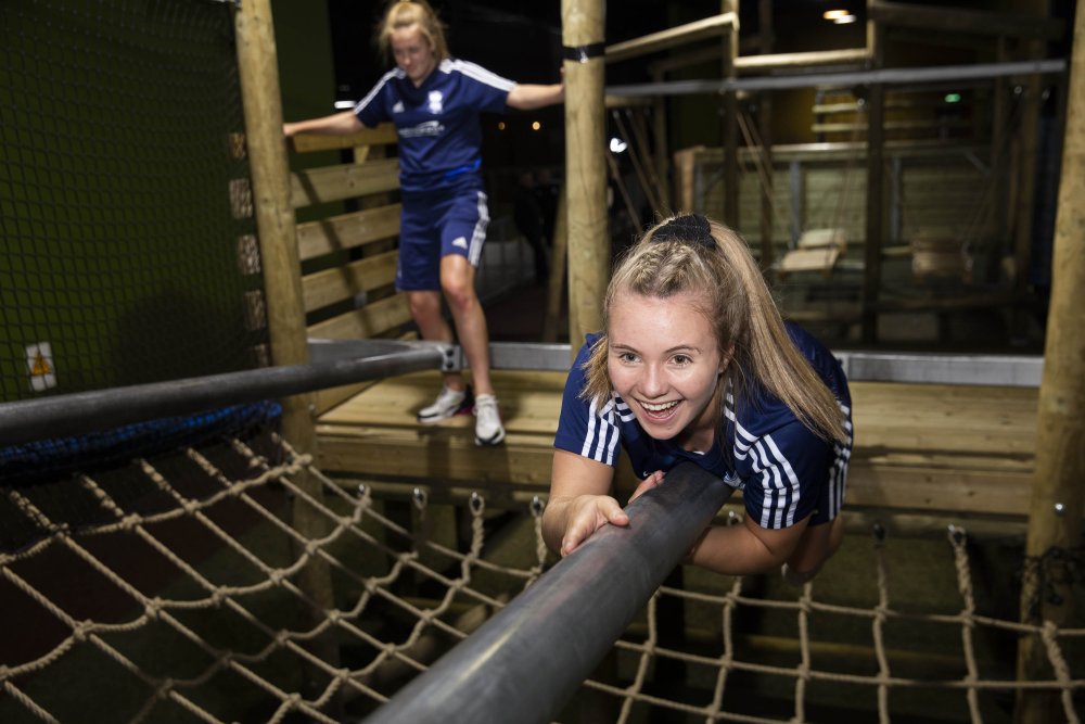 Two young girls on Assault Course at The Bear Grylls Adventure